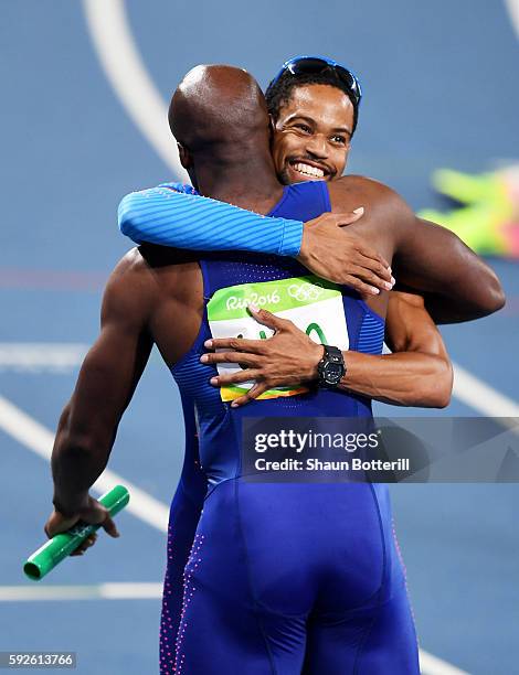 Lashawn Merritt and Arman Hall of the United States celebrate after winning gold in the Men's 4 x 400 meter Relay on Day 15 of the Rio 2016 Olympic...
