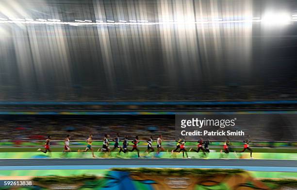 Hagos Gebrhiwet of Ethiopia leads the pack in the Men's 5000m Final on Day 15 of the Rio 2016 Olympic Games at the Olympic Stadium on August 20, 2016...