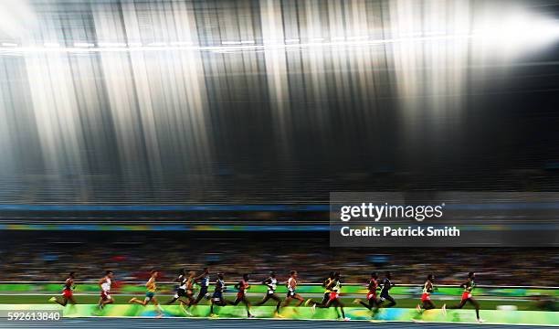 Hagos Gebrhiwet of Ethiopia leads the pack in the Men's 5000m Final on Day 15 of the Rio 2016 Olympic Games at the Olympic Stadium on August 20, 2016...