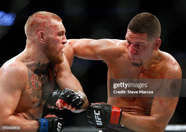 Conor McGregor and Nate Diaz battle during their welterweight rematch at the UFC 202 event at T-Mobile Arena on August 20, 2016 in Las Vegas, Nevada.