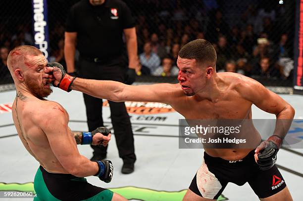 Nate Diaz fights Conor McGregor of Ireland in their welterweight bout during the UFC 202 event at T-Mobile Arena on August 20, 2016 in Las Vegas,...