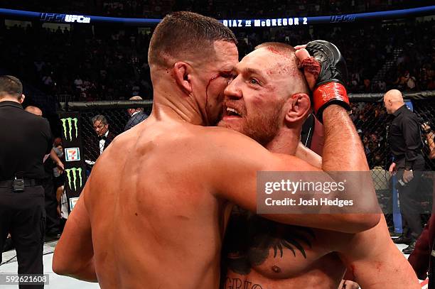 Nate Diaz embraces Conor McGregor of Ireland after their welterweight bout during the UFC 202 event at T-Mobile Arena on August 20, 2016 in Las...