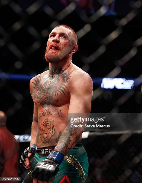 Conor McGregor reacts at the end of his welterweight rematch against Nate Diaz at the UFC 202 event at T-Mobile Arena on August 20, 2016 in Las...