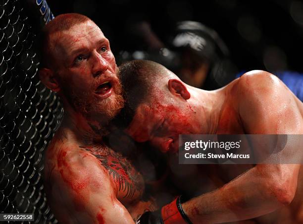 Conor McGregor and Nate Diaz battle during their welterweight rematch at the UFC 202 event at T-Mobile Arena on August 20, 2016 in Las Vegas, Nevada....