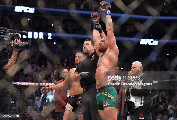 Conor McGregor of Ireland celebrates his victory over Nate Diaz in their welterweight bout during the UFC 202 event at T-Mobile Arena on August 20,...