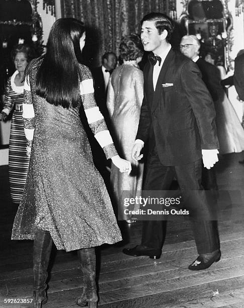 Prince Charles, the Prince of Wales, dancing with Lady Charlotte Manners at charity ball, at Belvoir Castle, England, April 1st 1971.