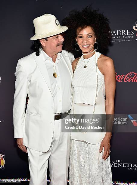 Recording artist Carlos Santana and his wife, musician Cindy Blackman, attend the Padres Contra El Cancer's 16th annual "El Sueno de Esperanza"...