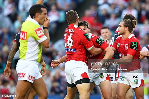 Gareth Widdop of the Dragons celebrates with team mates after scoring a try during the round 24 NRL match between the Sydney Roosters and the St...