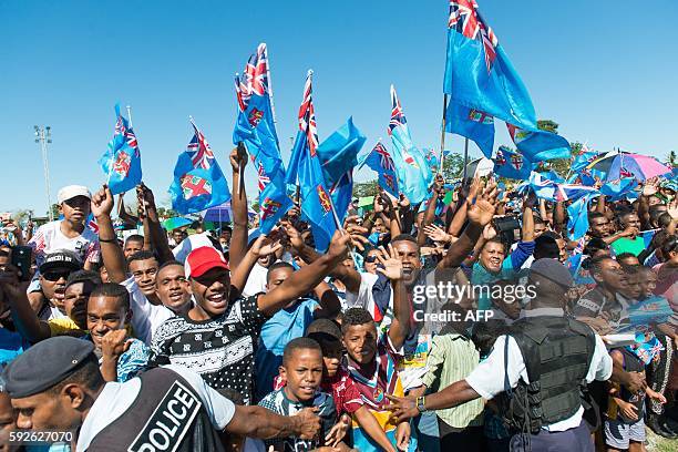 Fans greet Fiji's Olympic gold-medal-winning men's sevens rugby team on their return from Rio, at Prince Charles Park in Nadi on August 21, 2016. The...