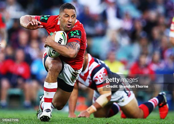 Benji Marshall of the Dragons runs the ball during the round 24 NRL match between the Sydney Roosters and the St George Illawarra Dragons at Allianz...