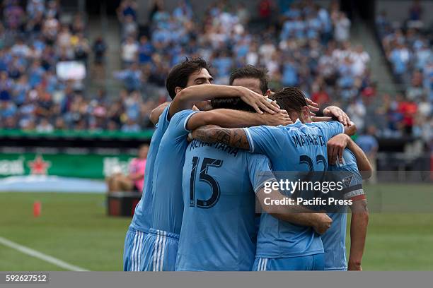 Players celebrate goal by David Villa during MLS match against LA Galaxy on Yankees stadium NYC FC won 1 - 0.