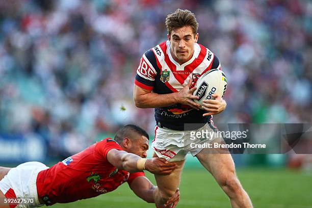 Connor Watson of the Roosters runs the ball during the round 24 NRL match between the Sydney Roosters and the St George Illawarra Dragons at Allianz...