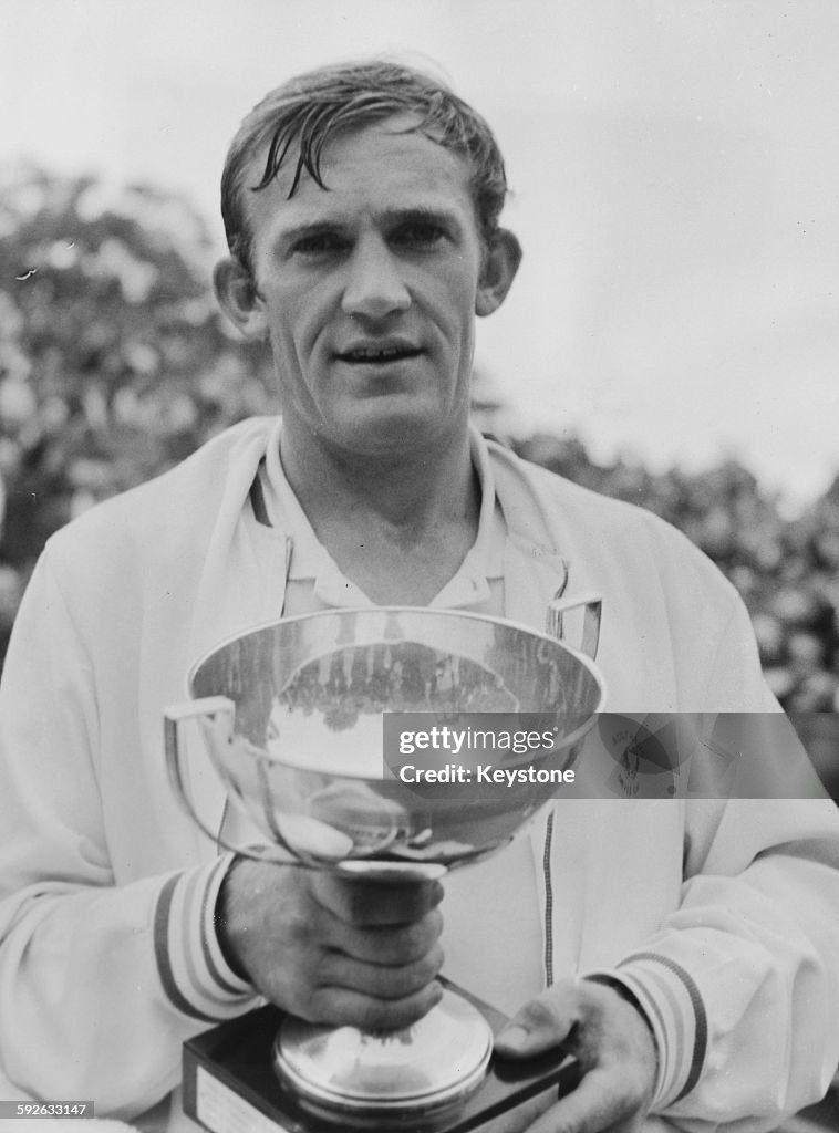 Tony Rouch Australian tennis player Tony Roche holding the cup after winning the ...