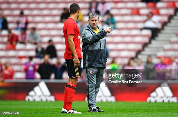 Sunderland assistant manager Paul Bracewell talks to Jack Rodwell prior to the Premier League match between Sunderland and Middlesbrough at Stadium...