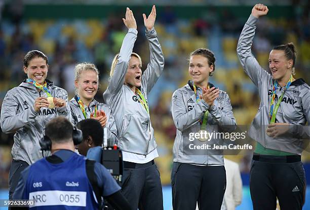 Gold medalists Annike Krahn, Leonie Maier, Saskia Bartusiak, Josephine Henning and Almuth Schult of Germany pose during the medal ceremony for the...