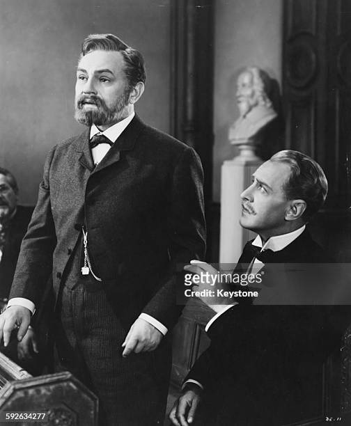 Actors Edward G Robinson and Otto Kruger in a scene from the film 'Dr Ehrlich's Magic Bullet', 1940.