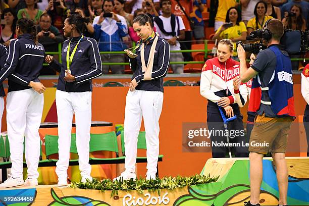 Alexandra Lacrabere of France with the silver medals during the Women's Handball Gold medal match between France and Russia at Future Arena on Day 15...