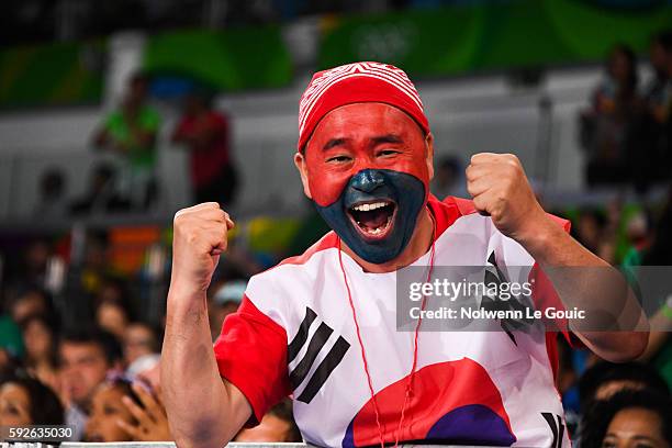 Fans of South Korea during the Men's +80kg Bronze Medal contest on Day 15 of the Rio 2016 Olympic Games at Carioca Arena 3 on August 20, 2016 in Rio...