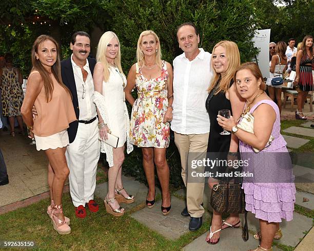 Maria Elena Christiansen, Gary Rein, Colleen Rein, Ruth Miller, Jacques Acoca, Adele Nino and Carlita Pinillos attend the AVENUE on the Beach...