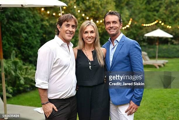 Alex Cohen, Nicole Tunick and Frederico Azevedo attend the AVENUE on the Beach Celebrates Of Rare Origin and our August Issue at the Baker House on...
