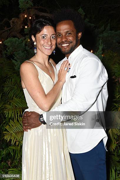 Octavia Giovannini-Torelli and Roger Ramirez attend the AVENUE on the Beach Celebrates Of Rare Origin and our August Issue at the Baker House on...