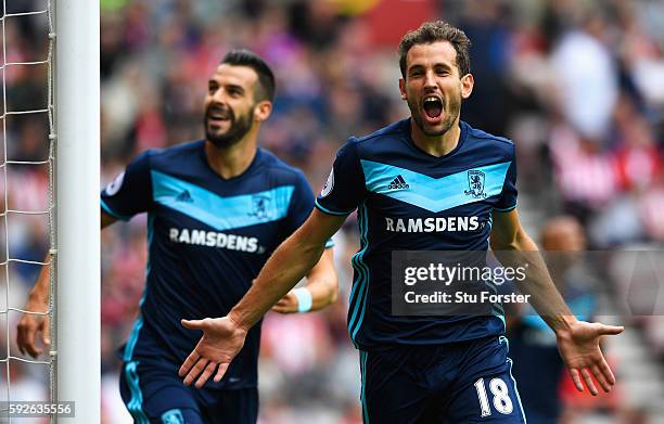 Christian Stuani of Middlesbrough celebrates scoring the opening goal with Alvaro Negredo during the Premier League match between Sunderland and...