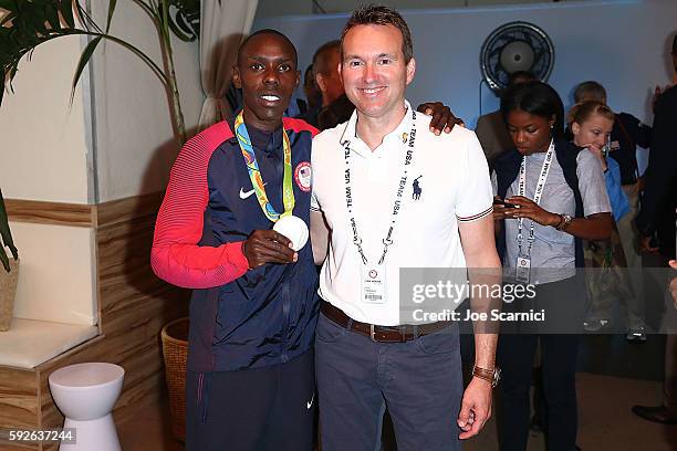 Olympian Paul Kipkemoi Chelimo and Secretary of the Army Eric Fanning attend a USA Presidential Delegation visit to the USA House at Colegio Sao...