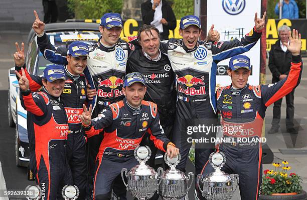 Spain's Marc Marti and Dani Sordo, France's Sebastien Ogier, Belgium's Nicolas Gilsoul, Volkswagen motorsport manager Jost Capito, France's Julien...