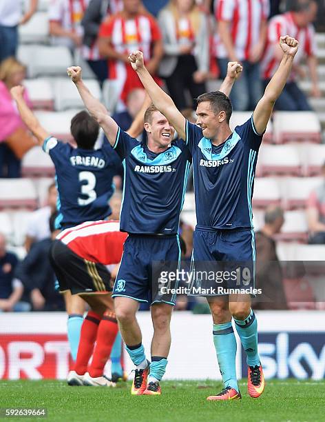 Adam Forshaw and Stewart Downing of Middlesbrough celebrate victory after the Premier League match between Sunderland and Middlesbrough at Stadium of...