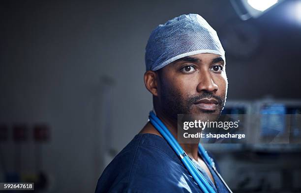 he's got a calling to cure - surgical cap stock pictures, royalty-free photos & images