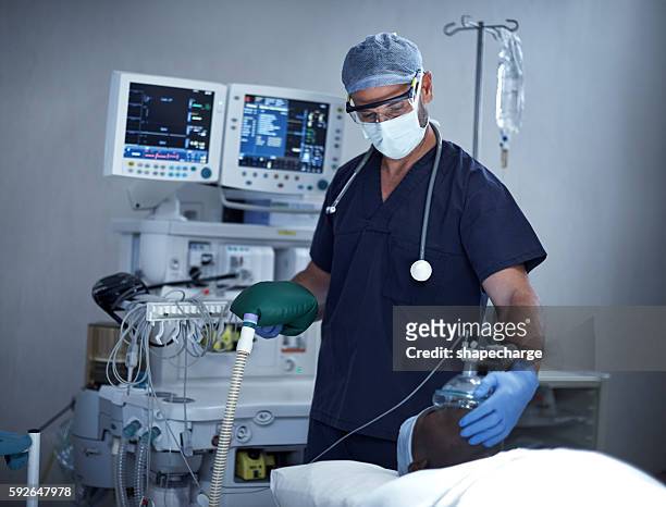 helping him to breathe - anaesthetist stock pictures, royalty-free photos & images