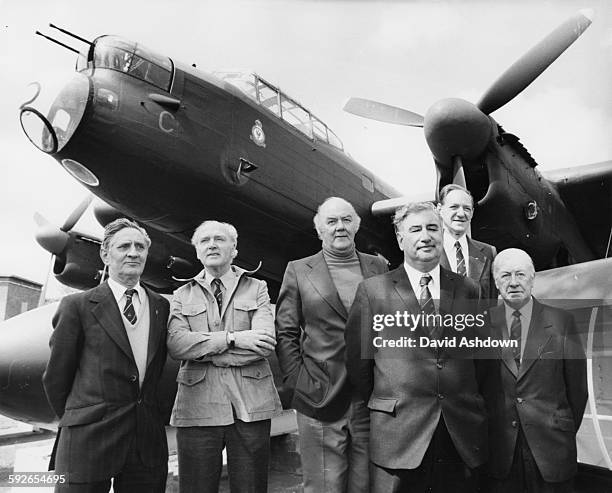 Surviving members of the Dambusters 617 Squadron standing in front of a Lancaster Bomber; Ernie Twells, Bill Townsend, Ivan Whittaker, Bill Howarth,...