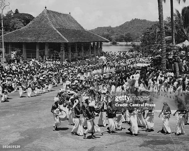 Kandyan dancers and drummers welcoming Queen Elizabeth II and her Royal procession to Audience Hall, Kandy, April 19th 1954.