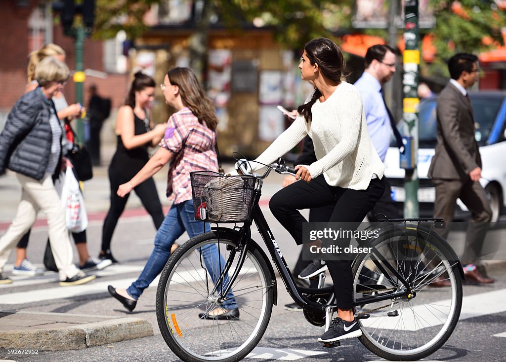 Bike in motion, panning blur in traffic