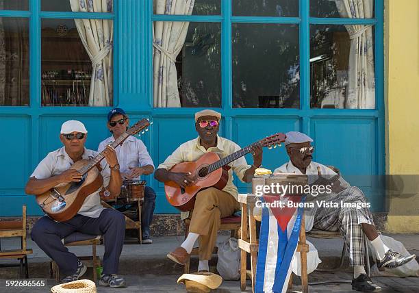 a cuban band in a street of old havana - caribbean musical instrument stock pictures, royalty-free photos & images