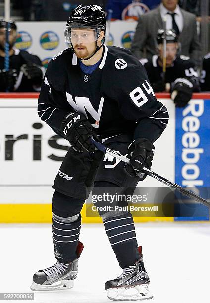 Mikhail Grabovski of the New York Islanders plays in the game against the New Jersey Devils at Barclays Center on November 3, 2015 in Brooklyn...