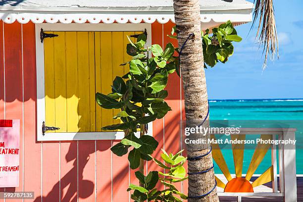 colorful buildings on the turks and caicos islands - turks and caicos islands stock pictures, royalty-free photos & images