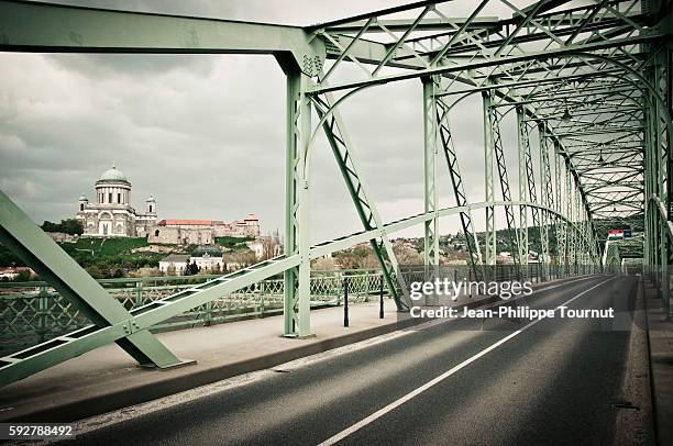 view on castle hill and esztergom basilica (the largest church in hungary) from the mária valéria bridge, at the border between slovakia and hungary - slovakia castle stock pictures, royalty-free photos & images