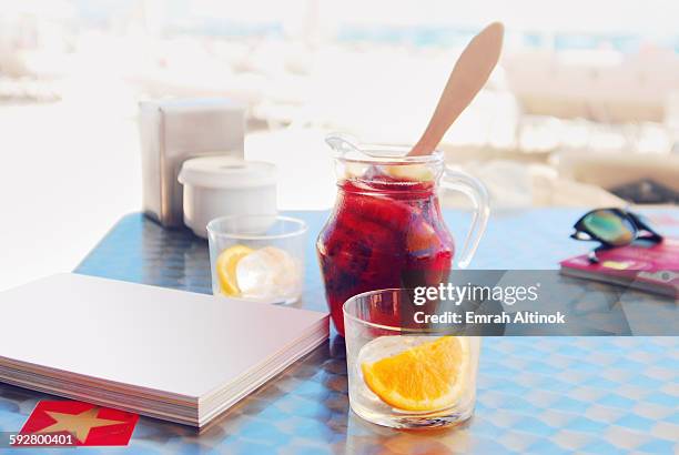 a book / magazine with blank cover on table - magazine table ストックフォトと画像