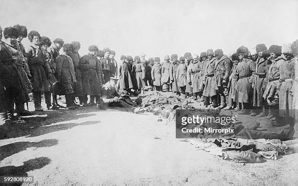 World War One Eastern front Soldiers of the Russian Southern army counting the dead after their battle in the town of Lemberg, the capital of Galacia...