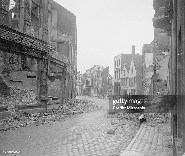 The Belgian town of Termonde after being recaptured is now only a heap of ruins, and the picture shows the devastation caused by the Germans during...