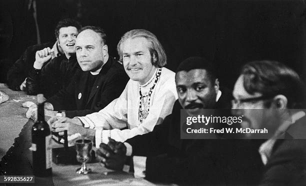 View of panelists on stage during 'An Evening with God' onstage at the Fillmore East, New York, New York, May 13, 1967. Pictured are, from left,...