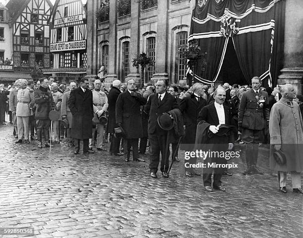 Elebrities including Air Chief Marshall Sir John Salmen line up outside the Beauvais Town Hall in France for the funeral procession of the victims of...