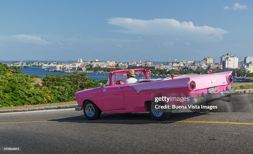 Old American car and view of Havana