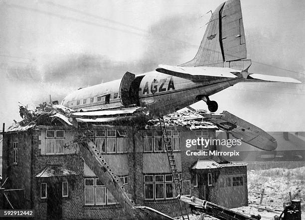 Dakota air liner of Railway Air Services crashed into two houses in South Ruislip. No one was injured. December 1946 P004265
