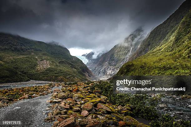 approach to franz josef glacier - grey glacier stock pictures, royalty-free photos & images