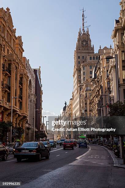 gran via in central madrid, spain. - gran vía madrid foto e immagini stock