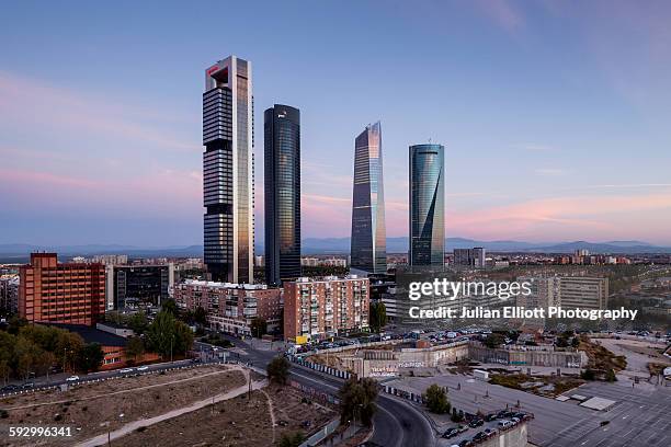 cuatro torres business area in madrid, spain. - paseo de la castellana madrid fotografías e imágenes de stock