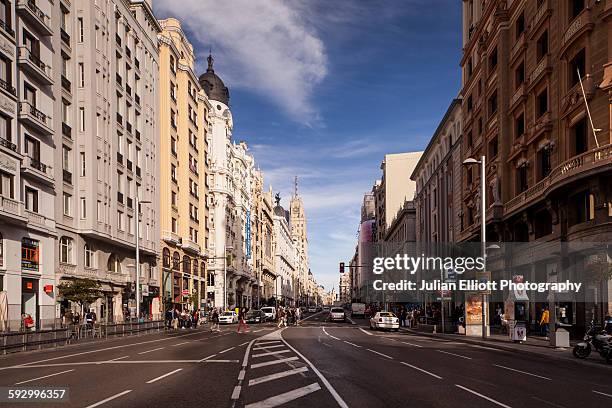 gran via in central madrid, spain. - madrid street stock pictures, royalty-free photos & images