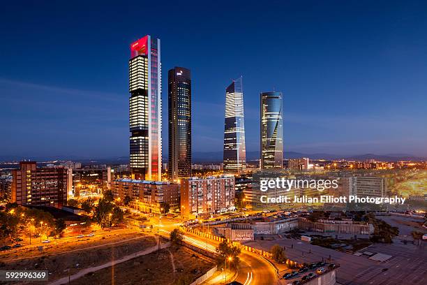 cuatro torres business area in madrid, spain. - perfil de ciudad fotografías e imágenes de stock